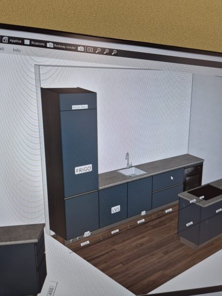 Moderne keukeninrichting met donkerblauwe kasten en een aanrechtblad.